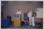 Dr. Suzanna Rose, Seth Gadinsky (speaking), Pam, Natasha, Liebe, and Naomi Gadsinsky by Women's Studies Center, Florida International University