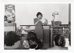 Joan Mills delivers her presentation at the 1988 Women's Studies Colloquium by Women's Studies Center, Florida International University