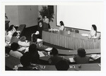 Awilda Haskins serves as moderator at the 1988 Women's Studies Colloquium by Women's Studies Center, Florida International University