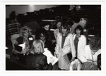 Attendees at the 1990 Women's Studies Colloquium have their books signed by author Barbara Ehrenreich by Women's Studies Center, Florida International University