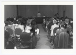 Attendees listen to a presentation at the 1991 Women's Studies Colloquium by Women's Studies Center, Florida International University